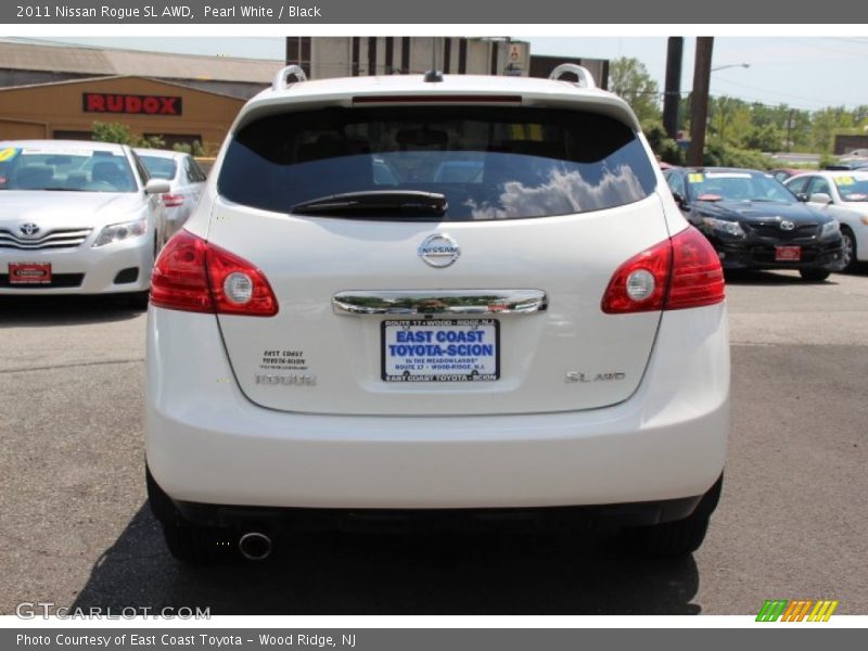 Pearl White / Black 2011 Nissan Rogue SL AWD