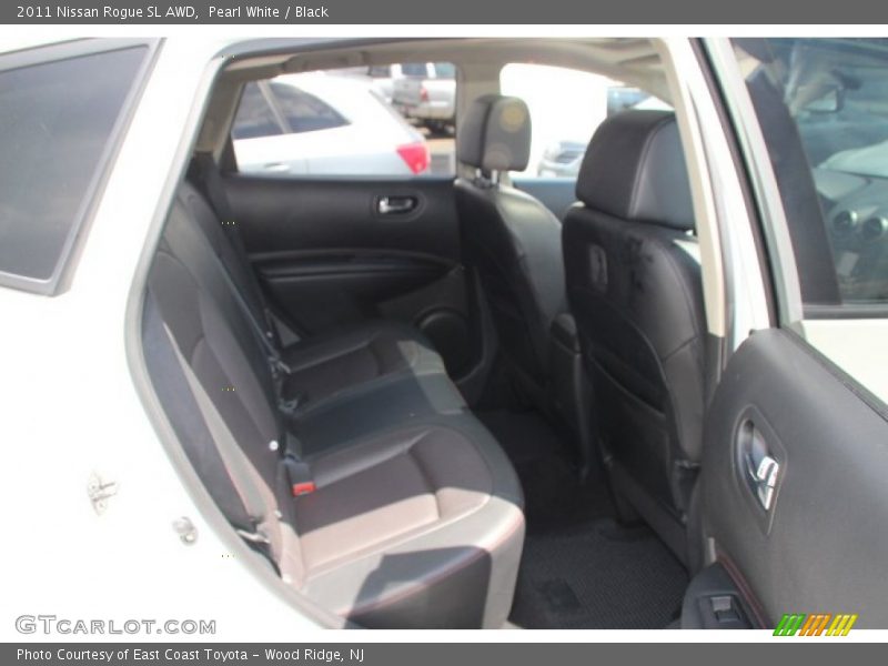 Pearl White / Black 2011 Nissan Rogue SL AWD