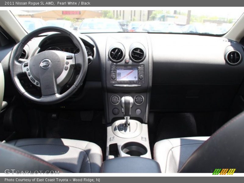 Pearl White / Black 2011 Nissan Rogue SL AWD