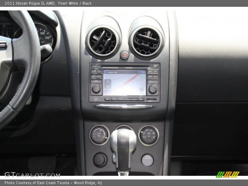 Pearl White / Black 2011 Nissan Rogue SL AWD