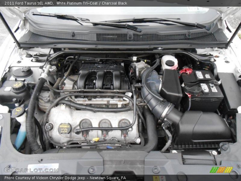 White Platinum Tri-Coat / Charcoal Black 2011 Ford Taurus SEL AWD