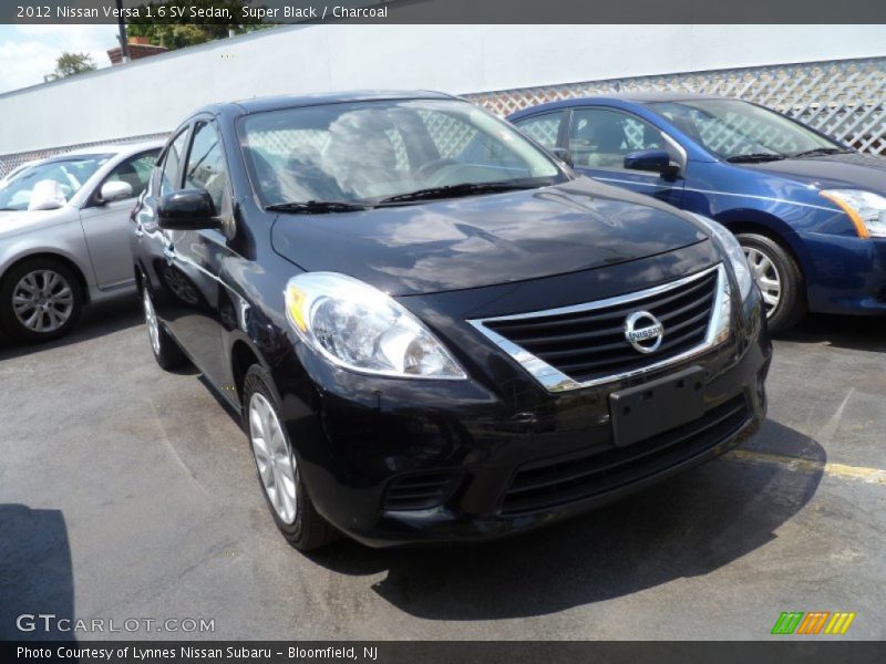 Super Black / Charcoal 2012 Nissan Versa 1.6 SV Sedan