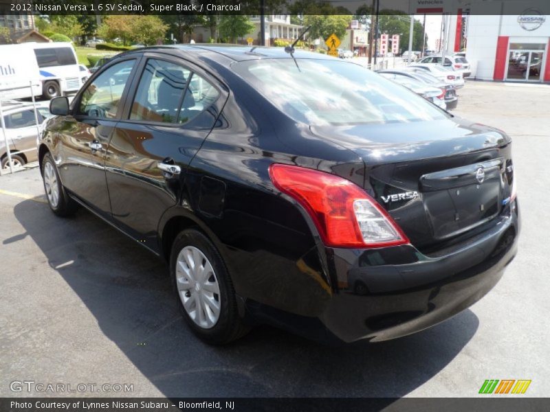 Super Black / Charcoal 2012 Nissan Versa 1.6 SV Sedan
