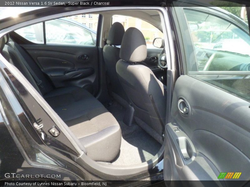 Super Black / Charcoal 2012 Nissan Versa 1.6 SV Sedan
