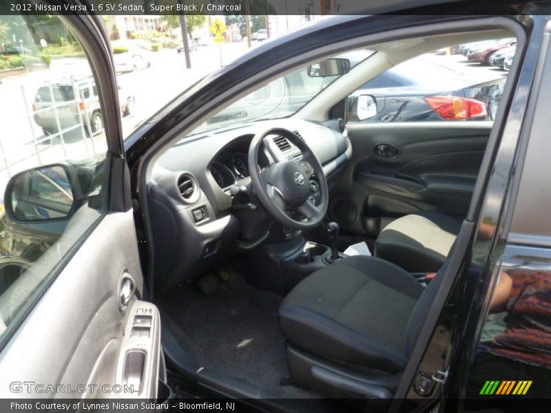Super Black / Charcoal 2012 Nissan Versa 1.6 SV Sedan