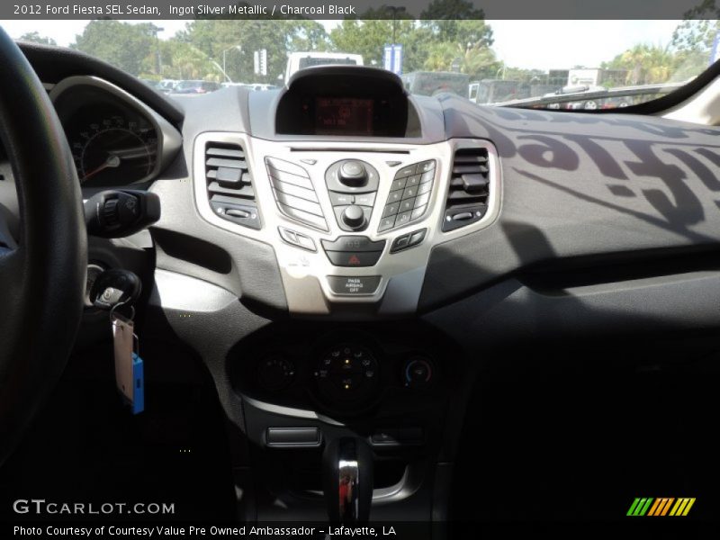 Ingot Silver Metallic / Charcoal Black 2012 Ford Fiesta SEL Sedan