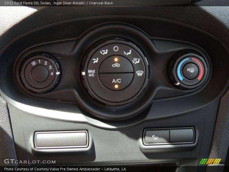 Ingot Silver Metallic / Charcoal Black 2012 Ford Fiesta SEL Sedan