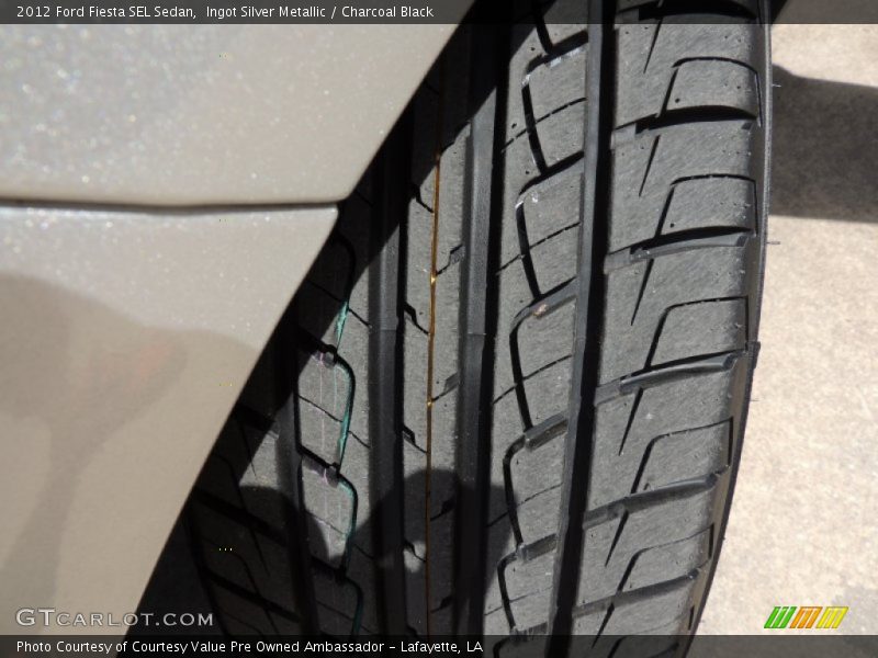 Ingot Silver Metallic / Charcoal Black 2012 Ford Fiesta SEL Sedan