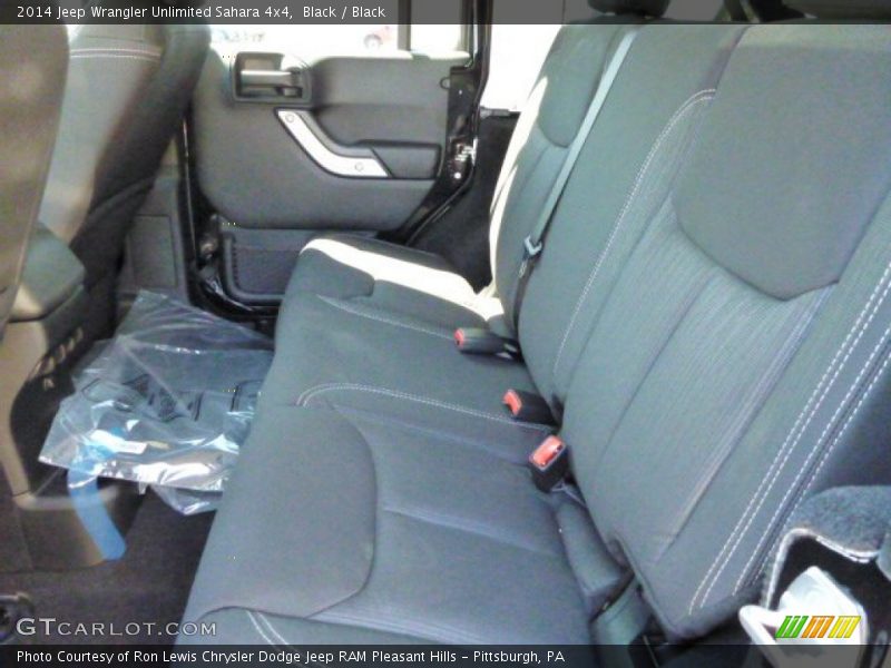 Black / Black 2014 Jeep Wrangler Unlimited Sahara 4x4