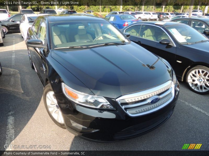 Ebony Black / Light Stone 2011 Ford Taurus SEL