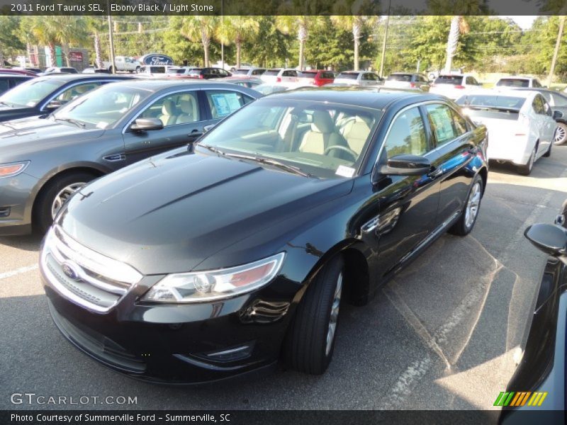 Ebony Black / Light Stone 2011 Ford Taurus SEL