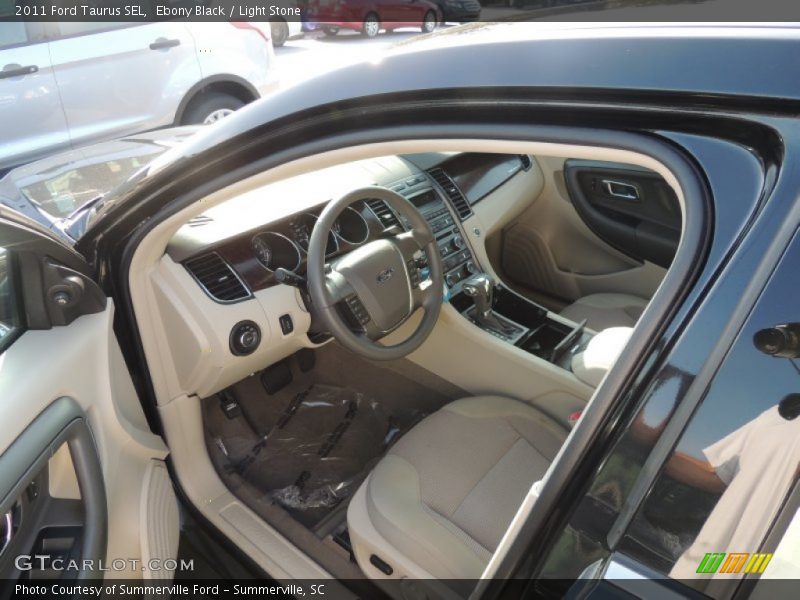 Ebony Black / Light Stone 2011 Ford Taurus SEL