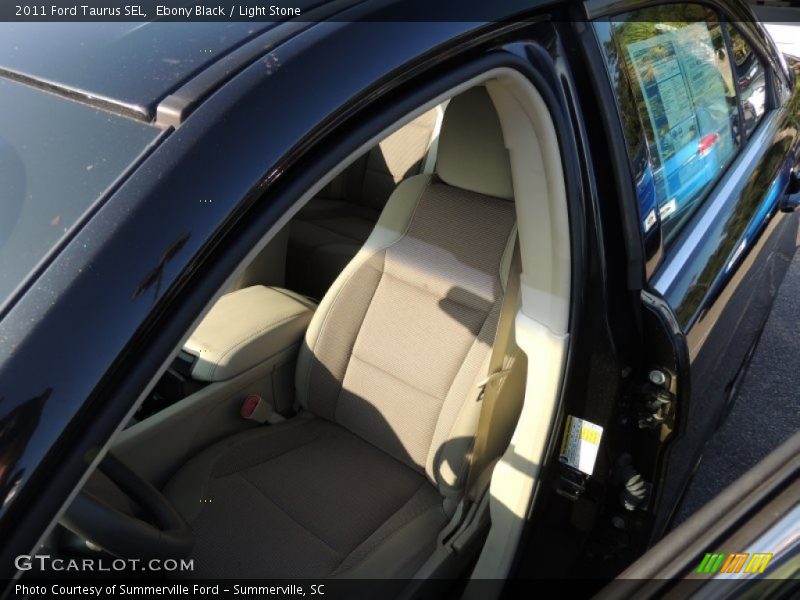 Ebony Black / Light Stone 2011 Ford Taurus SEL