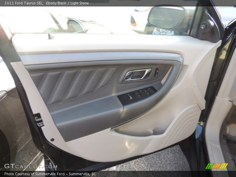 Ebony Black / Light Stone 2011 Ford Taurus SEL