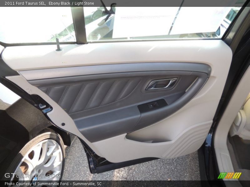 Ebony Black / Light Stone 2011 Ford Taurus SEL