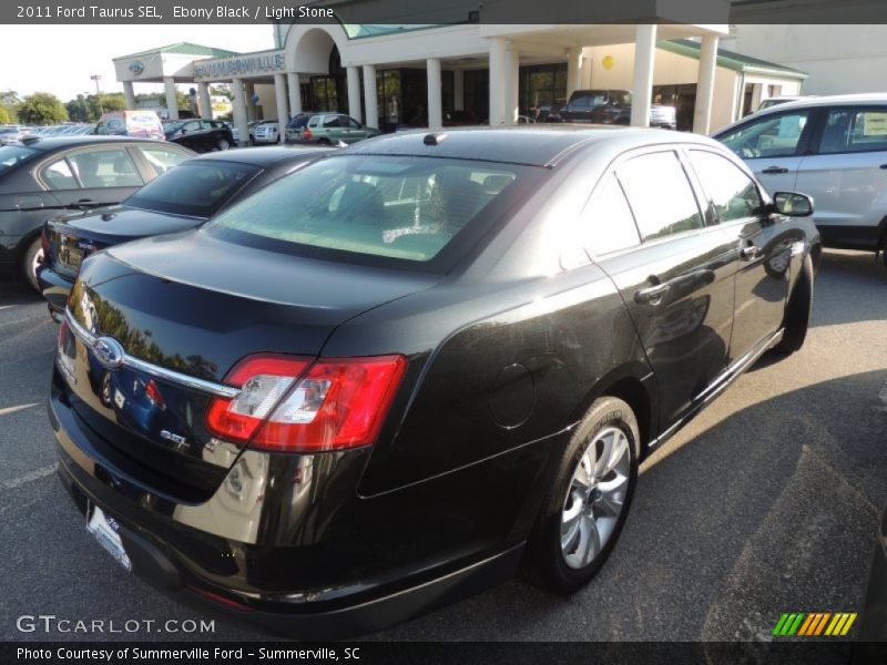 Ebony Black / Light Stone 2011 Ford Taurus SEL