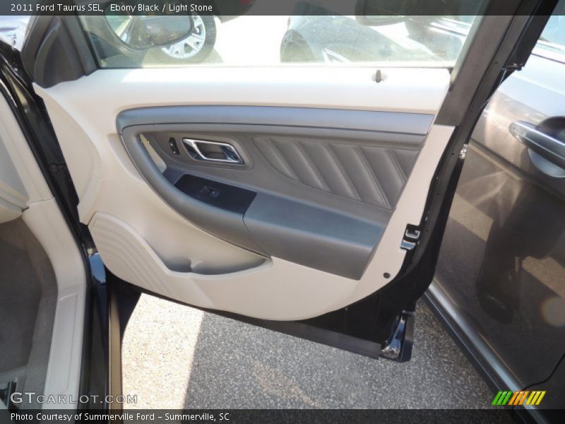 Ebony Black / Light Stone 2011 Ford Taurus SEL