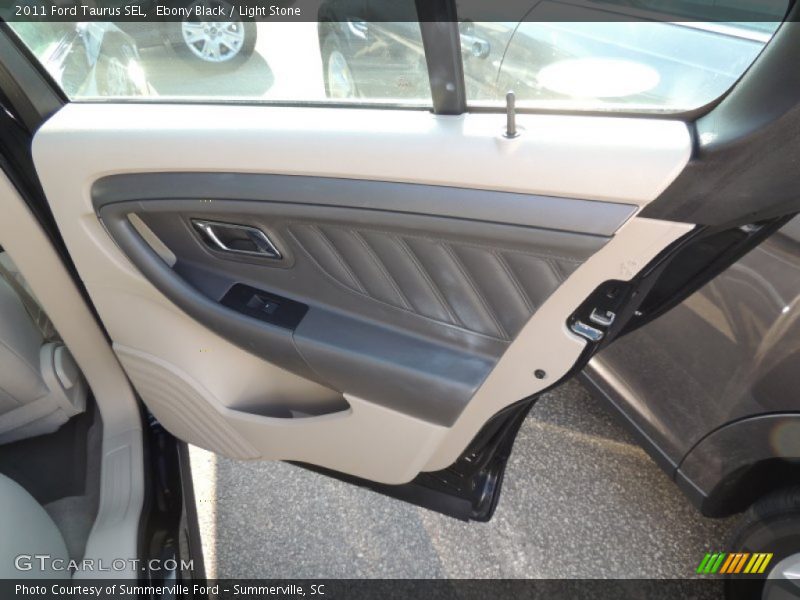 Ebony Black / Light Stone 2011 Ford Taurus SEL