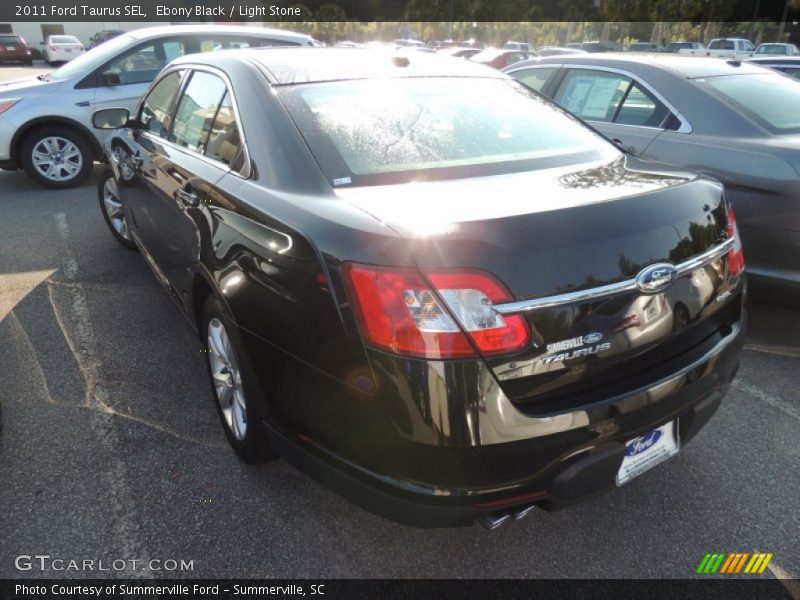 Ebony Black / Light Stone 2011 Ford Taurus SEL