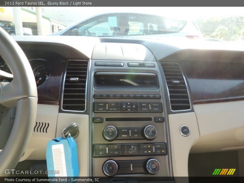 Ebony Black / Light Stone 2011 Ford Taurus SEL