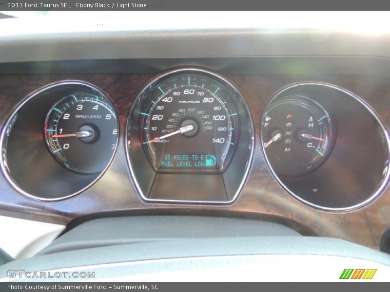 Ebony Black / Light Stone 2011 Ford Taurus SEL