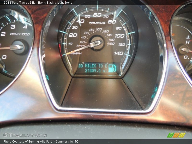 Ebony Black / Light Stone 2011 Ford Taurus SEL