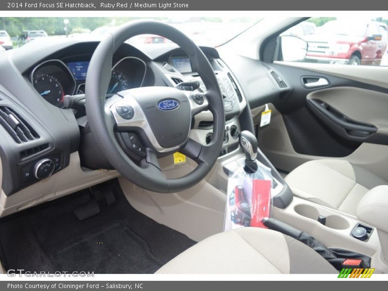 Ruby Red / Medium Light Stone 2014 Ford Focus SE Hatchback