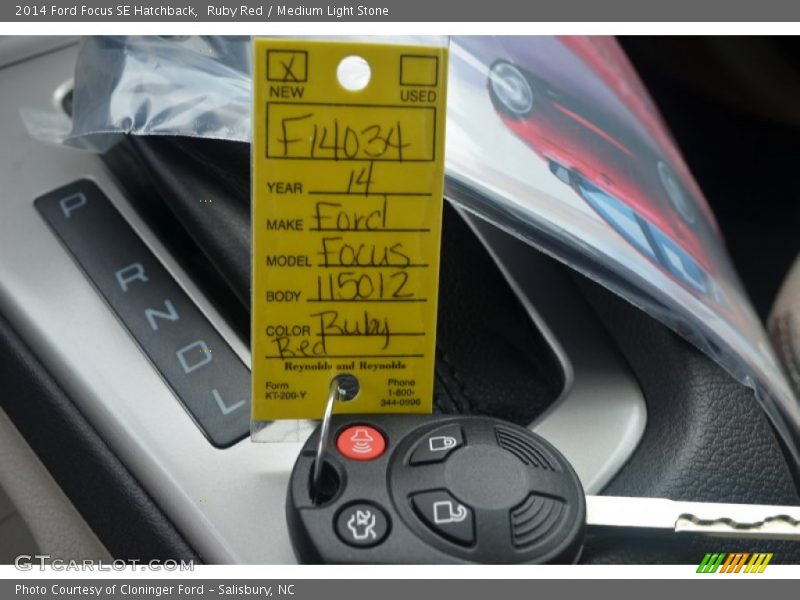 Ruby Red / Medium Light Stone 2014 Ford Focus SE Hatchback