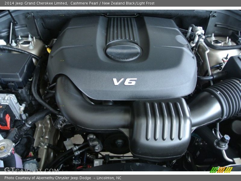 Cashmere Pearl / New Zealand Black/Light Frost 2014 Jeep Grand Cherokee Limited