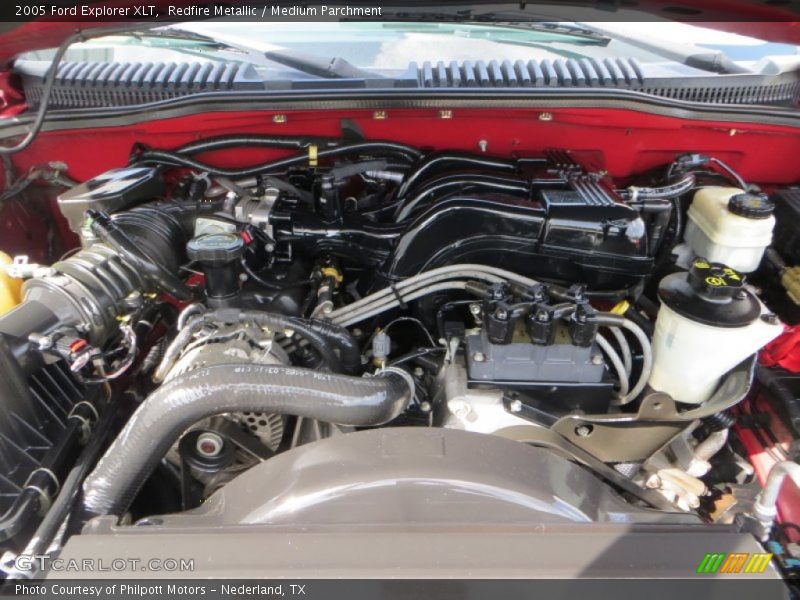 Redfire Metallic / Medium Parchment 2005 Ford Explorer XLT
