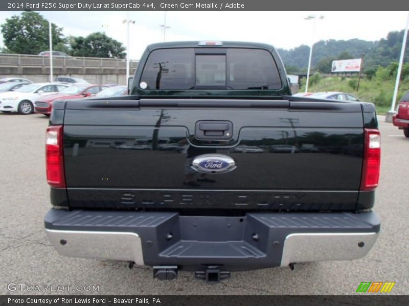 Green Gem Metallic / Adobe 2014 Ford F250 Super Duty Lariat SuperCab 4x4
