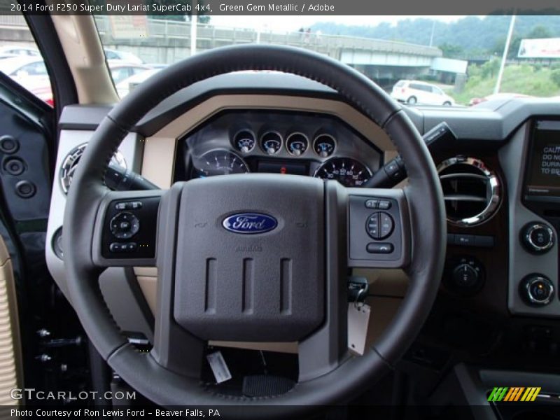 Green Gem Metallic / Adobe 2014 Ford F250 Super Duty Lariat SuperCab 4x4