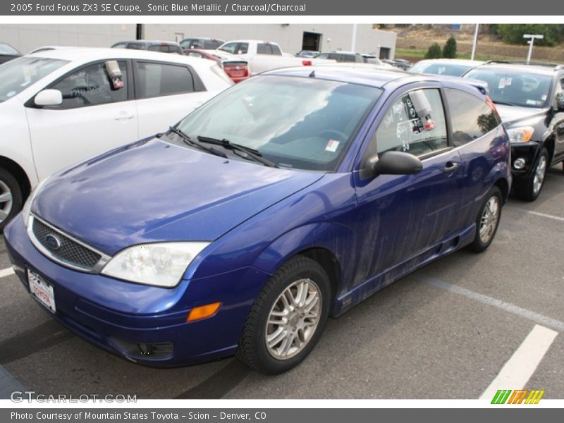 Sonic Blue Metallic / Charcoal/Charcoal 2005 Ford Focus ZX3 SE Coupe