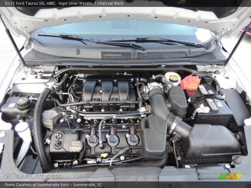 Ingot Silver Metallic / Charcoal Black 2013 Ford Taurus SEL AWD