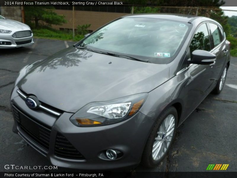 Front 3/4 View of 2014 Focus Titanium Hatchback