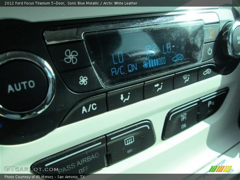 Sonic Blue Metallic / Arctic White Leather 2012 Ford Focus Titanium 5-Door