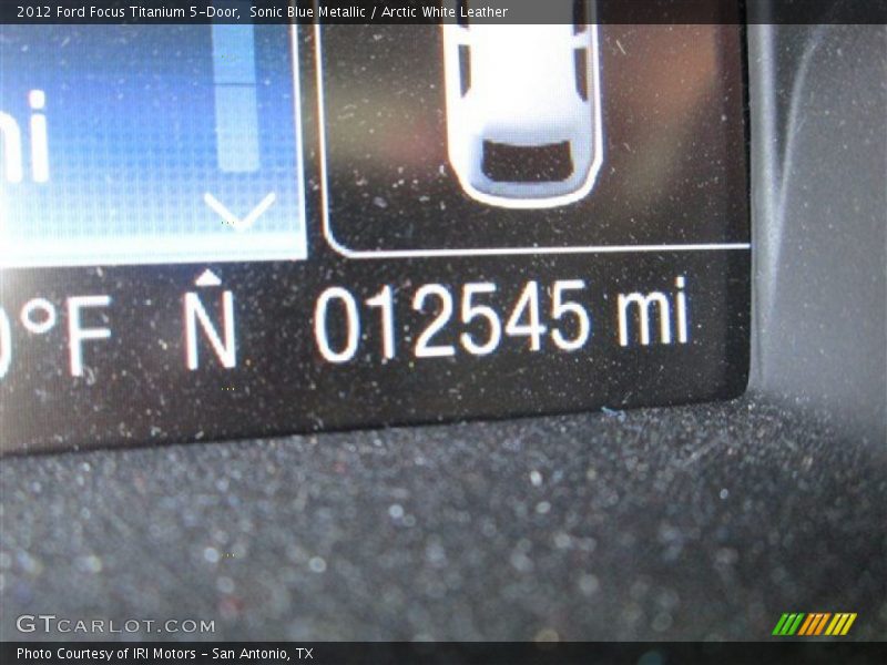 Sonic Blue Metallic / Arctic White Leather 2012 Ford Focus Titanium 5-Door