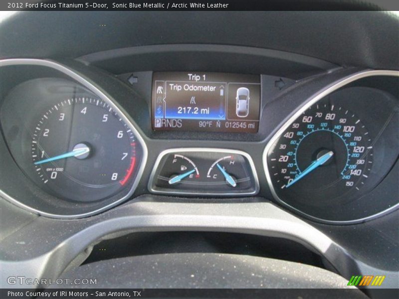 Sonic Blue Metallic / Arctic White Leather 2012 Ford Focus Titanium 5-Door