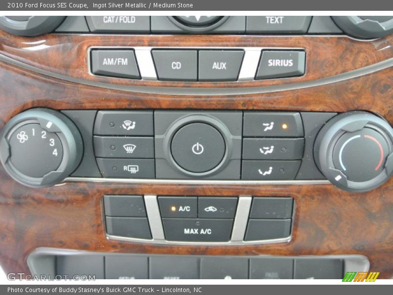 Ingot Silver Metallic / Medium Stone 2010 Ford Focus SES Coupe