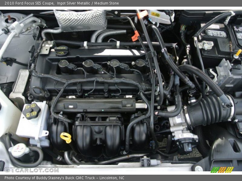 Ingot Silver Metallic / Medium Stone 2010 Ford Focus SES Coupe