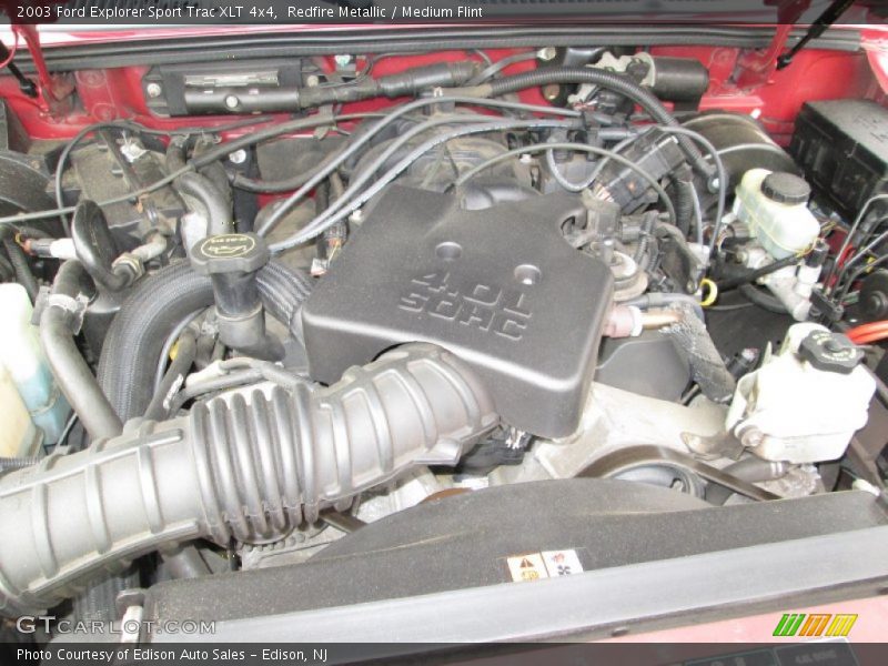Redfire Metallic / Medium Flint 2003 Ford Explorer Sport Trac XLT 4x4