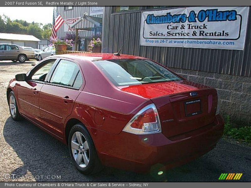 Redfire Metallic / Light Stone 2007 Ford Fusion SE