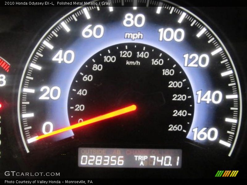 Polished Metal Metallic / Gray 2010 Honda Odyssey EX-L