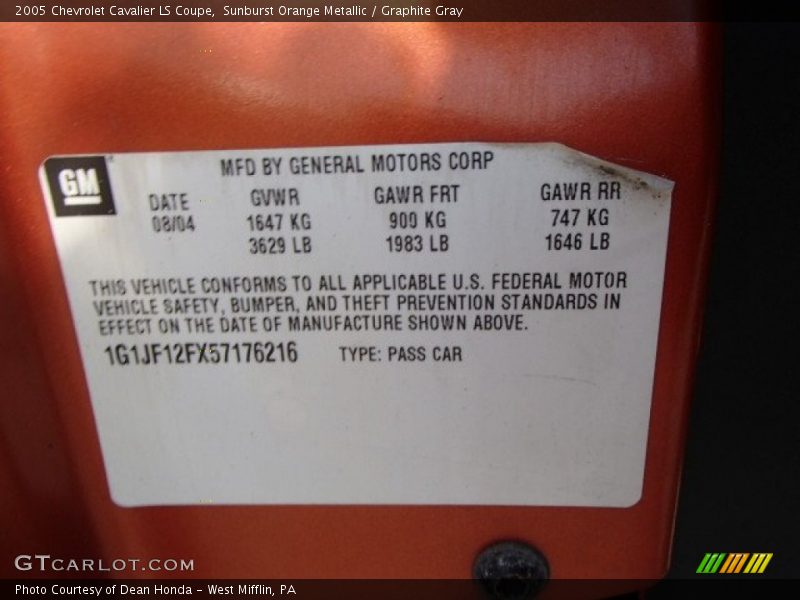 Sunburst Orange Metallic / Graphite Gray 2005 Chevrolet Cavalier LS Coupe