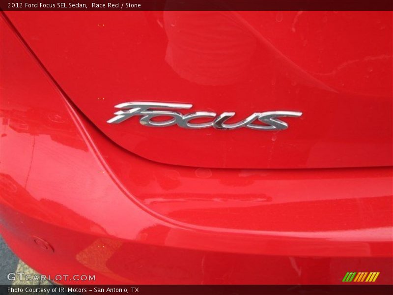 Race Red / Stone 2012 Ford Focus SEL Sedan