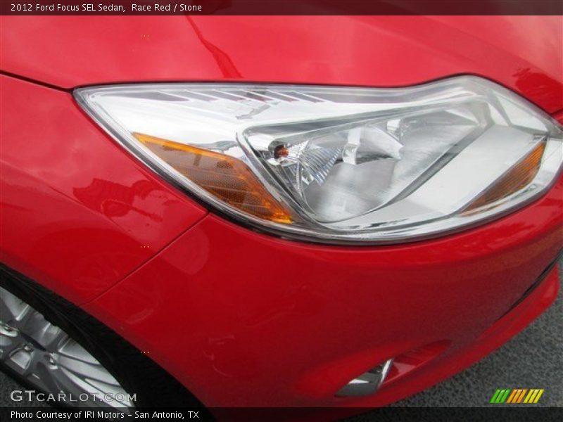 Race Red / Stone 2012 Ford Focus SEL Sedan
