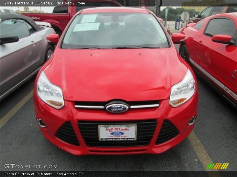 Race Red / Stone 2012 Ford Focus SEL Sedan