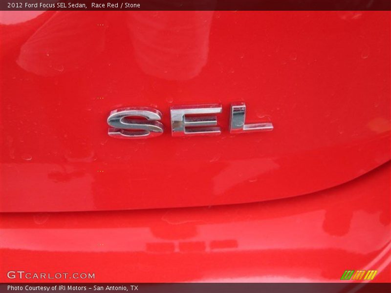 Race Red / Stone 2012 Ford Focus SEL Sedan