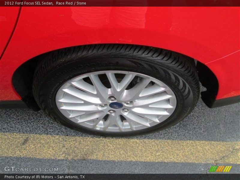 Race Red / Stone 2012 Ford Focus SEL Sedan