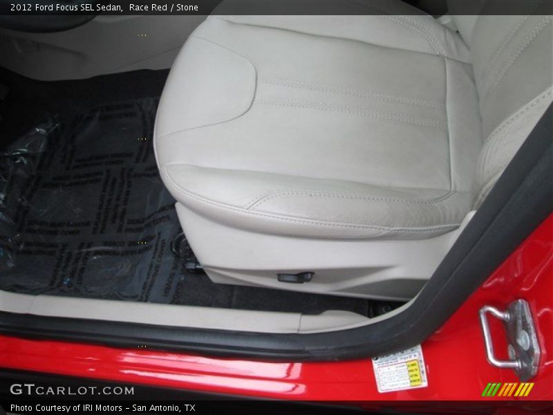 Race Red / Stone 2012 Ford Focus SEL Sedan